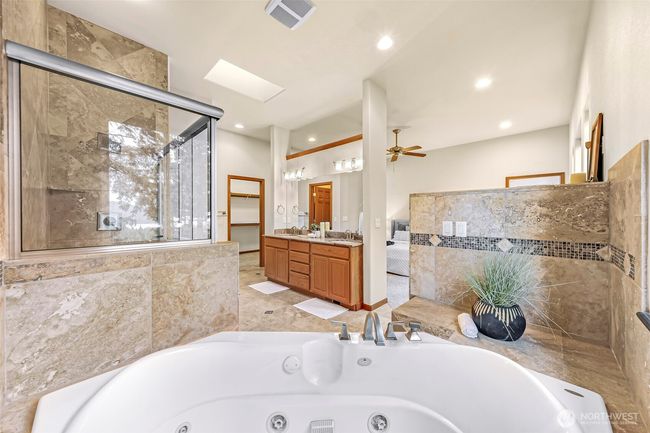 Jetted large tub, separate shower and walk-in closet off the bathroom | Image 14