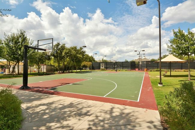 View of basketball court with fence and community basketball court | Image 31