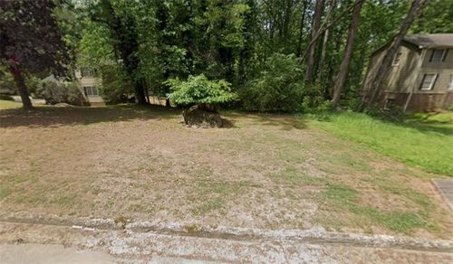 417 Arbor Ridge Dr, Stone Mountain, GA, 30087-4704 | Card Image