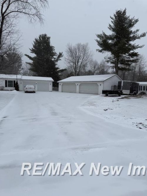 610 Quilette Street, Tobacco Township, MI, 48612 | Card Image