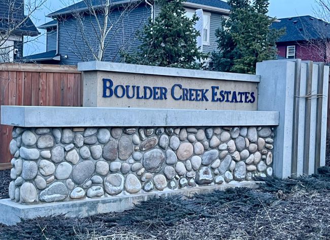 556 Boulder Creek Bay Se, Home with 3 bedrooms, 2 bathrooms and 4 parking in Langdon AB | Image 47