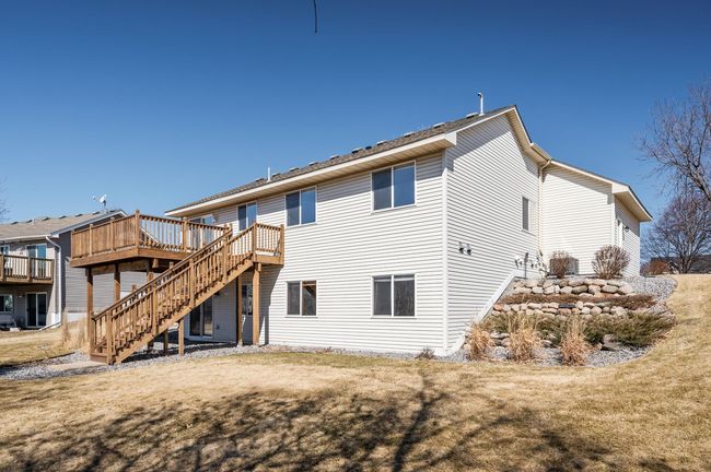 Walk out basement to level yard on pond/wetland | Image 48