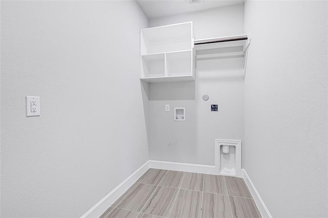 Utility room on the 1st floor. There is 1 half-bath on the 1st floor too. | Image 20