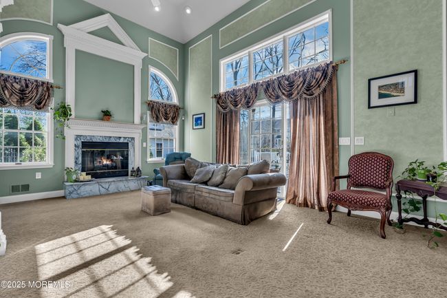2 Story Family Room with gas fireplace and sliders to outside | Image 18