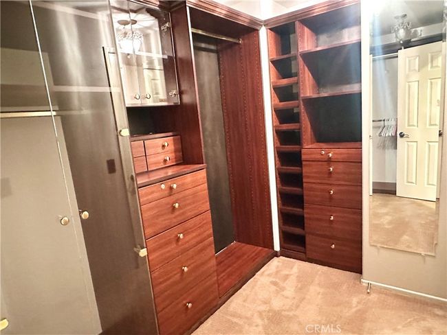 Spacious, custom Beautiful built-in closet in primary bedroom | Image 8