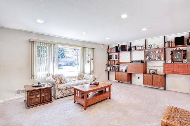 Carpeted living area with visible vents and recessed lighting | Image 5