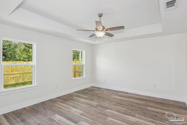 8512 Esplanade St, House other with 4 bedrooms, 2 bathrooms and 2 parking in Navarre FL | Image 6