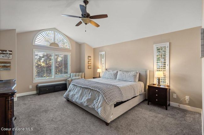 Upstairs primary bedroom with views of the lake! | Image 14