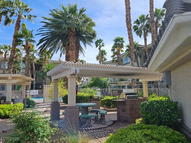 View of patio / terrace featuring fence and a pergola | Image 4