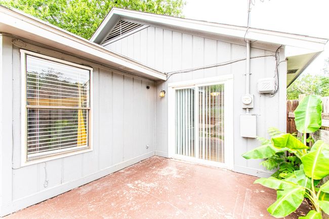 Entrance to property with a patio | Image 23