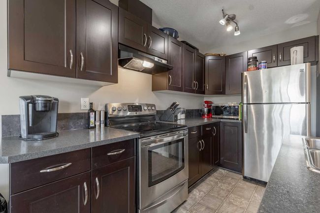 8 - 205 Silkstone Rd W, Townhouse with 3 bedrooms, 2 bathrooms and 2 parking in Lethbridge AB | Image 14