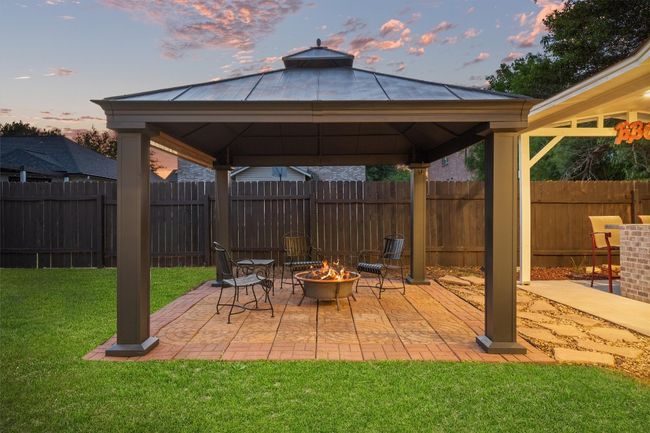 Enjoy all the Texas seasons and this amazing backyard truly built for entertaining. | Image 35