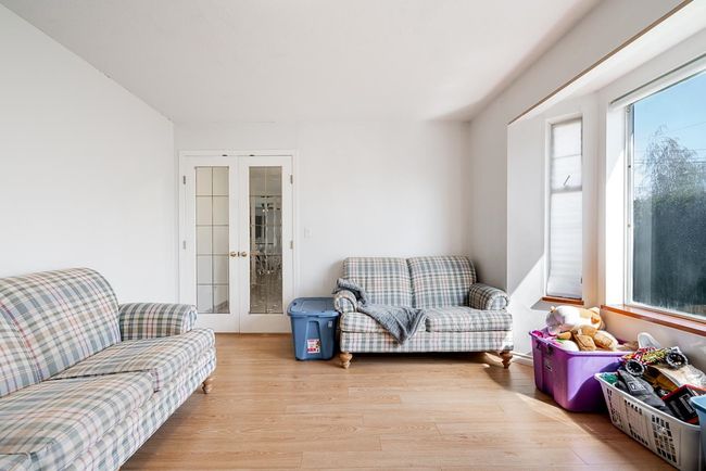 Living area featuring french doors and wood finished floors | Image 16
