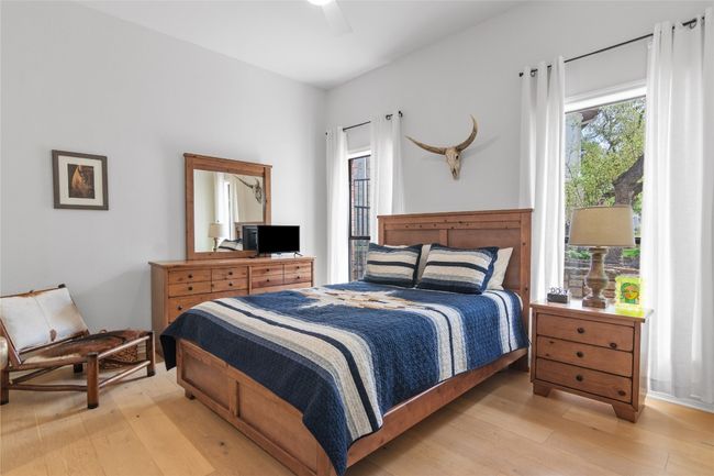Downstairs guest room, could also be an office. Has a full bath right outside the door. | Image 29