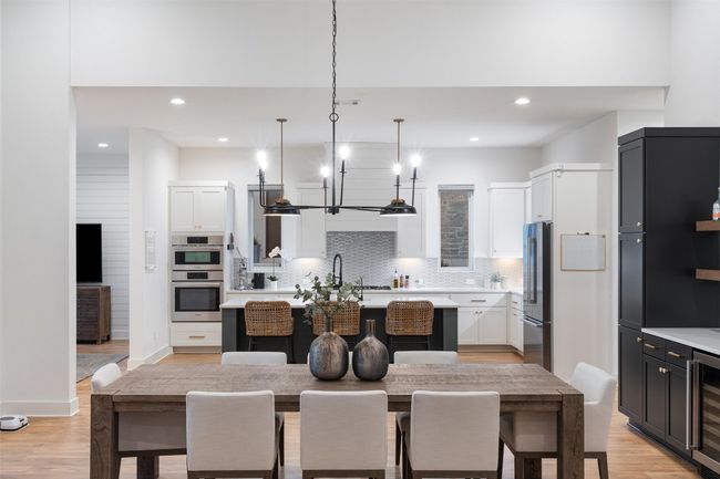 Gourmet kitchen with high ceilings, HUGE walk-in pantry and tons of storage. | Image 11
