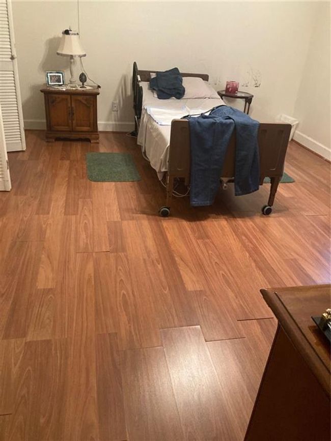 Bedroom featuring light hardwood / wood-style flooring | Image 8