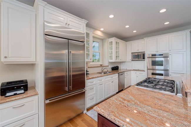 7293 S Uravan Court, House other with 4 bedrooms, 3 bathrooms and 3 parking in Foxfield CO | Image 7