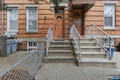 394 Woodlawn Ave, Jersey City, NJ, 07305-1306 | Card Image