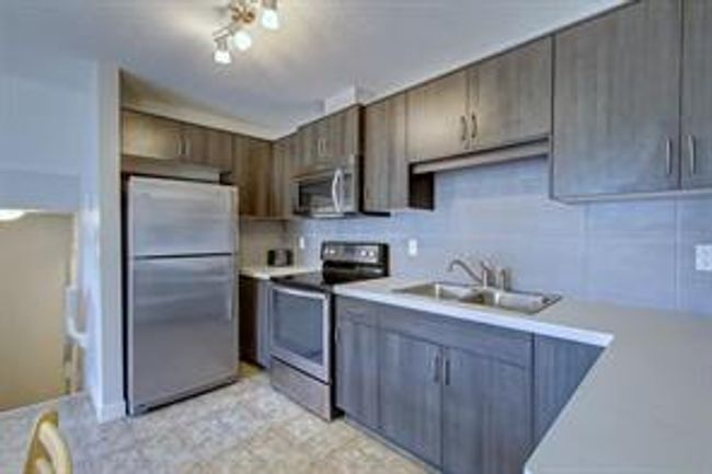 909 - 250 Sage Valley Rd Nw, Home with 2 bedrooms, 1 bathrooms and 2 parking in Calgary AB | Image 6