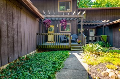 Doorway to property with a pergola | Image 2