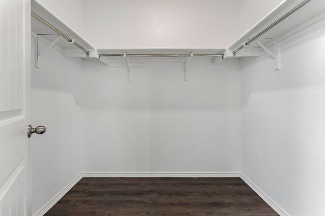 Primary Bedroom wood finished floors | Image 16