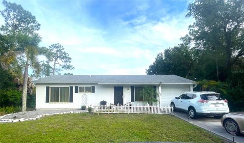 1003 Tropical Ave Nw, PORT CHARLOTTE, FL, 33948-3661 | Card Image