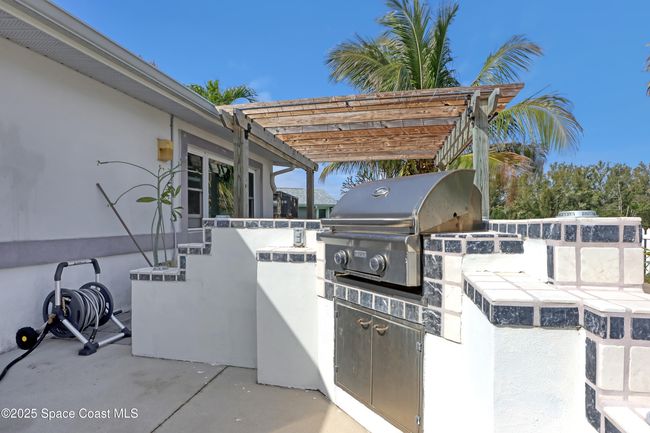 1061 Bali Rd, House other with 4 bedrooms, 2 bathrooms and null parking in Cocoa Beach FL | Image 47