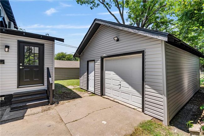 Detached garage featuring driveway | Image 49