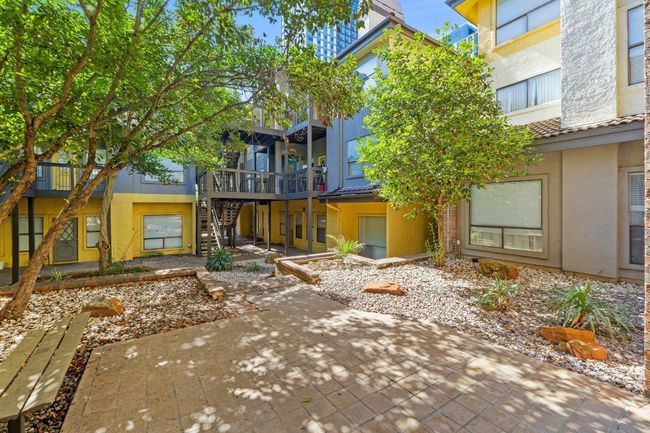 Croix Condos offer beautiful courtyards under a canopy of trees. | Image 31