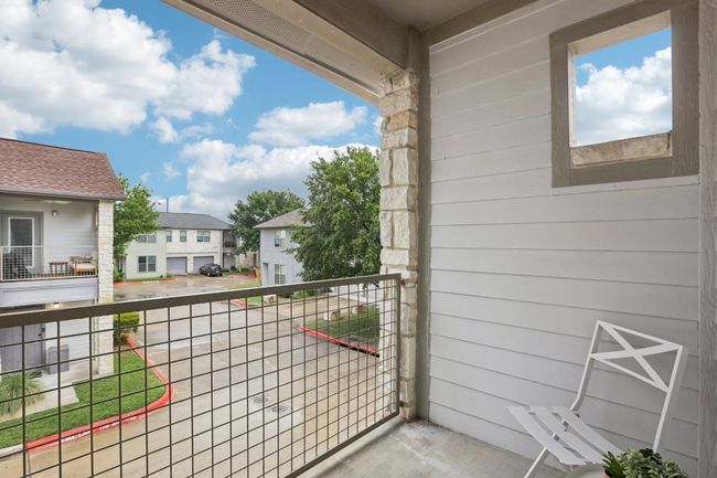 Balcony featuring a residential view. | Image 31