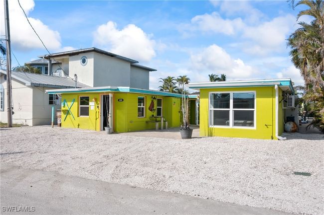 Rear view of property featuring a patio | Image 14