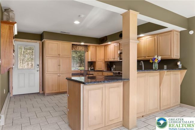Egress to Back Patio, Pantry, and Desk Area | Image 23