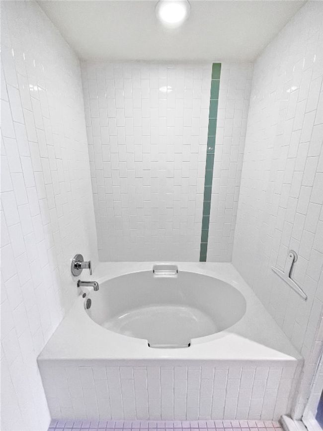 Bathroom with a bathtub | Image 19