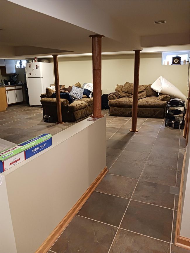 Finished basement with refrigerator and tile patterned flooring | Image 20