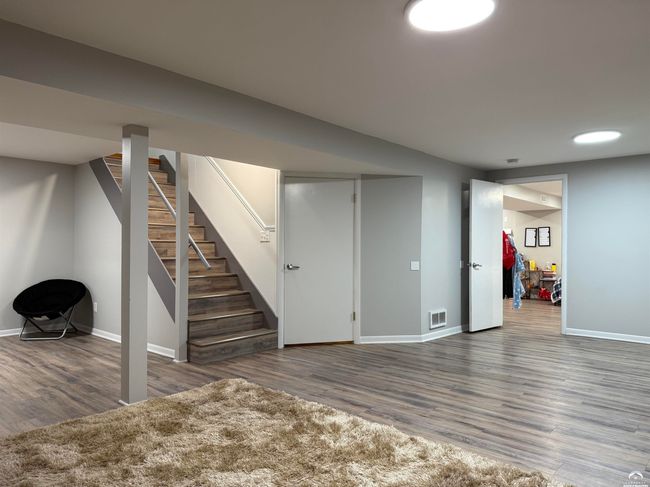 View to the East. Mechanical room to the left side in this photo - 4th Bedroom is east end of house. | Image 43