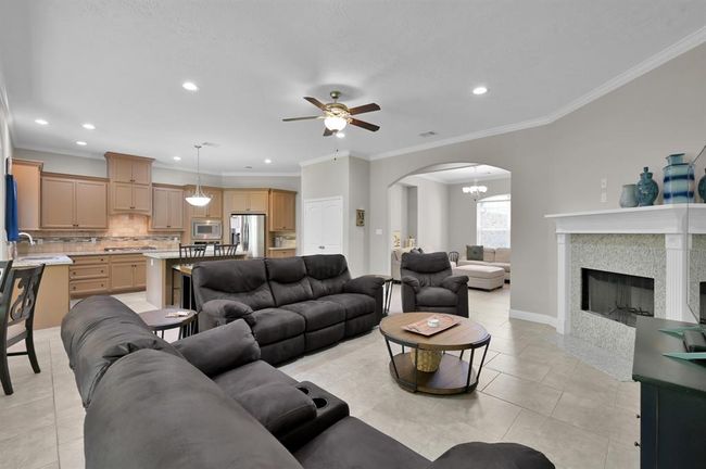 Living room with gas fireplace. | Image 13
