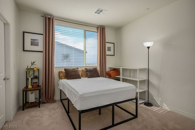 Bedroom upstairs featuring visible vents, light carpet, and baseboards | Image 26