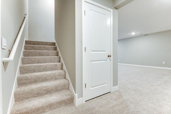 The finished lower-level recreation room provides yet another gathering space. Photo of model home, color and options will vary. | Image 35
