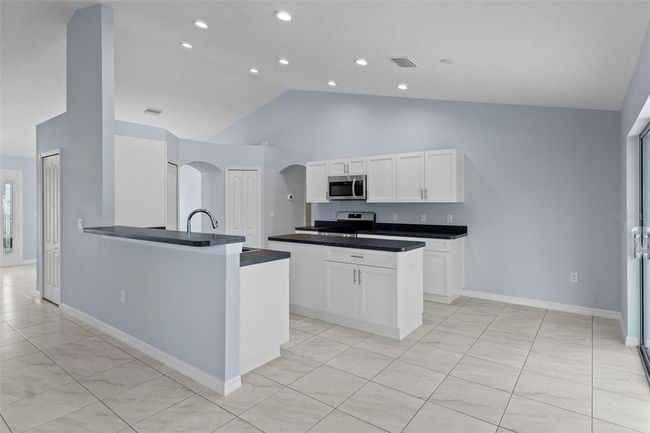 12493 Downy Woodpecker Rd, House other with 3 bedrooms, 2 bathrooms and null parking in WEEKI WACHEE FL | Image 13