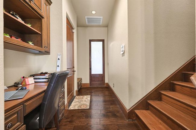 Desk nook, hallway to upstairs and laundry room | Image 30