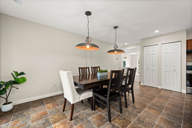 Dining area featuring stone finish flooring, recessed lighting, and baseboards | Image 15