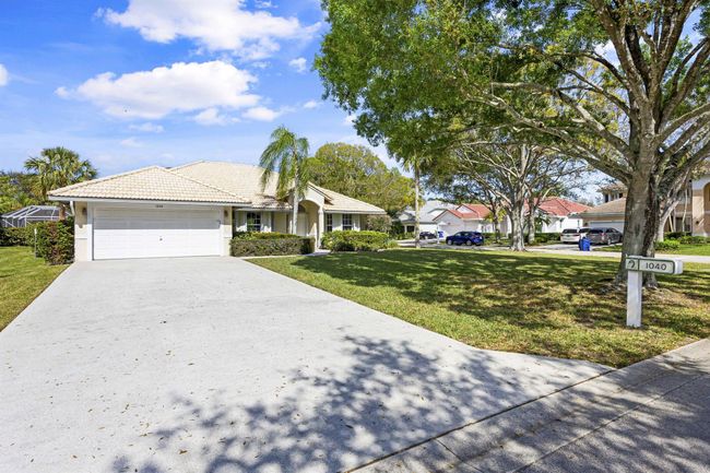 1040 Egret Circle Circle N, House other with 3 bedrooms, 2 bathrooms and null parking in Jupiter FL | Image 30