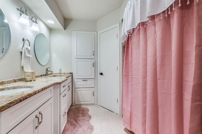 Full bath featuring double vanity | Image 11