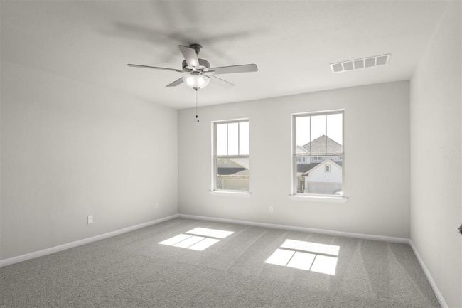 Empty room with ceiling fan, baseboards, carpet, and visible vents | Image 18