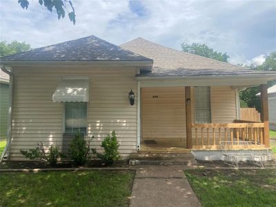 Bungalow-style home featuring a porch | Image 1