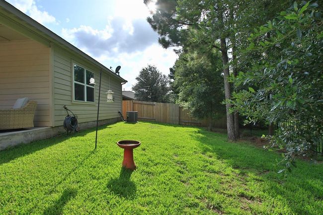 7551 Fettle Ln, House other with 3 bedrooms, 2 bathrooms and 2 parking in Conroe TX | Image 37