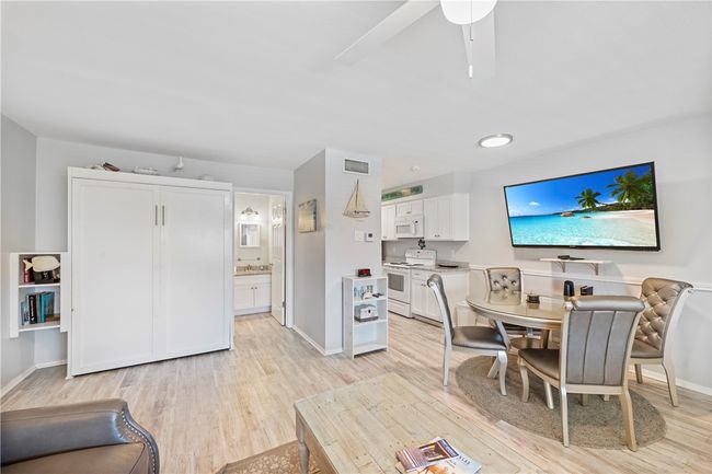 Murphy Bed up in. living room | Image 16