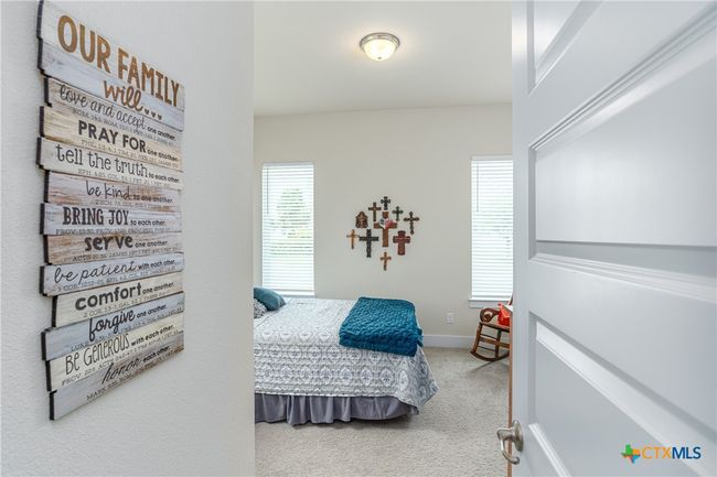 1st of 2 secondary bedrooms. | Image 22