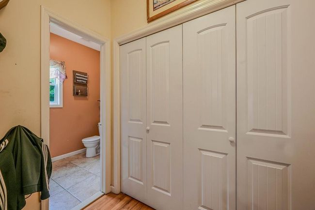 First Floor Laundry Area Off Of Two Car Garage & Half Bath | Image 14