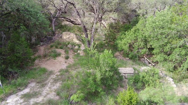 View of property location featuring a heavily wooded area | Image 8